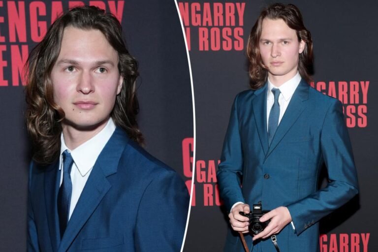 Ansel Elgort reveals off shoulder-length hair throughout uncommon pink carpet look