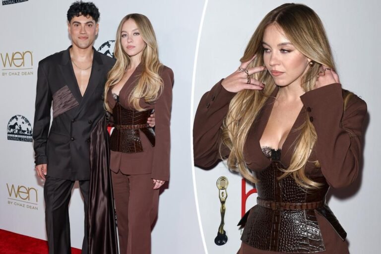 Sydney Sweeney cinches her waist in brown leather-based corset blazer