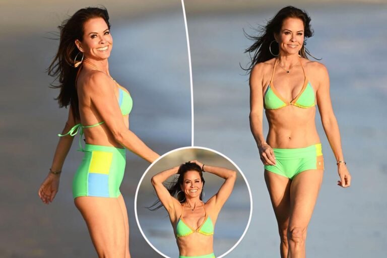 Brooke Burke, 53, flaunts toned abs in neon bikini