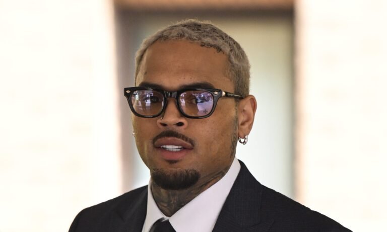 Chris Brown Seen W/ Jada Wallace Picture, Fan Reacts To Backlash