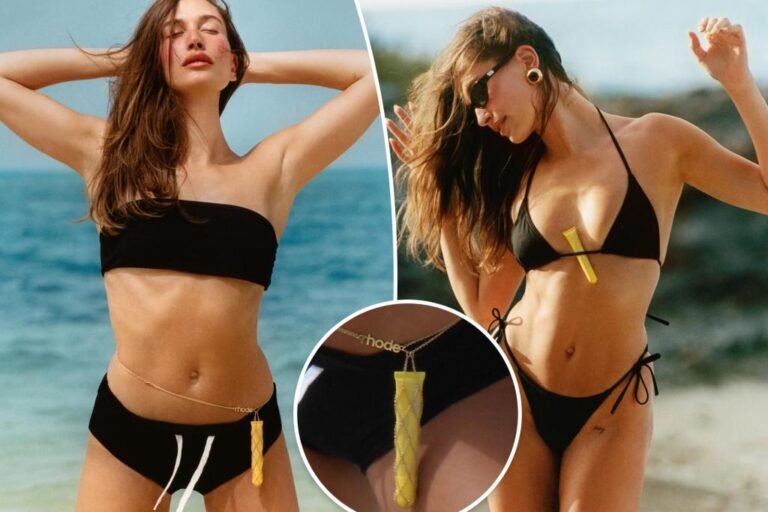 Hailey Bieber kinds her bikini with a customized Rhode stomach chain