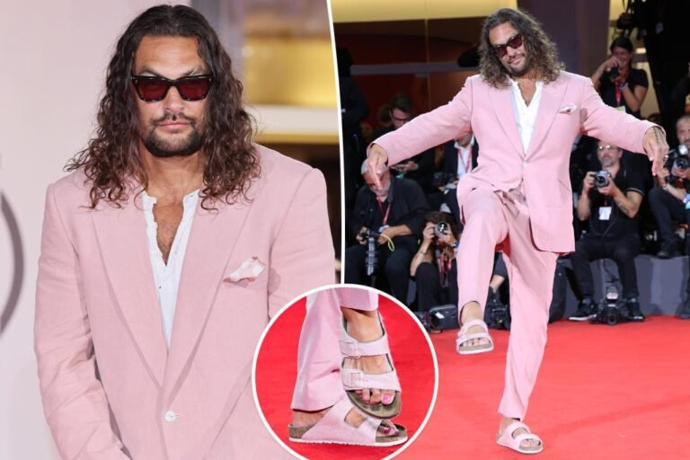 Jason Momoa paints his toenails pink to match his pink go well with at ‘Within the Hand of Dante’ premiere